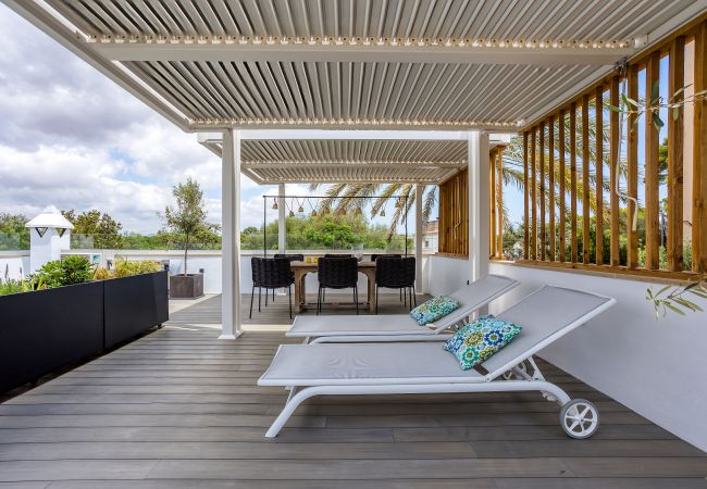 Chalet en Santanyi - La Casa Escaniana Acogedora casa vacacional con piscina climatizada a solo 200 m de la playa en Cala Santanyi  Chalet en Santanyi - La Casa Escaniana Acogedora casa vacacional con piscina climatizada a solo 200 m de la playa en Cala Santanyi