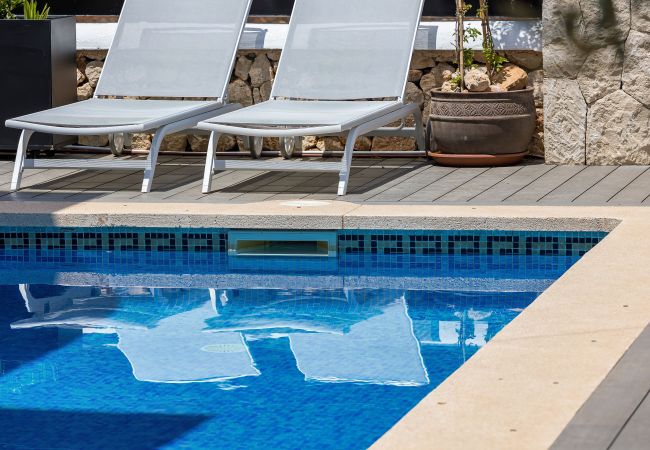 Chalet en Santanyi - La Casa Escaniana Acogedora casa vacacional con piscina climatizada a solo 200 m de la playa en Cala Santanyi  Chalet en Santanyi - La Casa Escaniana Acogedora casa vacacional con piscina climatizada a solo 200 m de la playa en Cala Santanyi