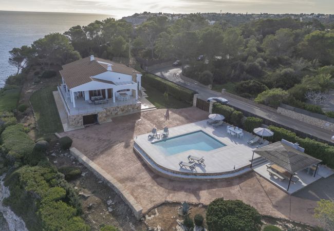 Villa en Cala Santanyi - Villa Can Ferrando casa vacacional en Cala Santanyi en primera línea de mar con lujo mediterráneo Villa en Cala Santanyi - Villa Can Ferrando casa vacacional en Cala Santanyi en primera línea de mar con lujo mediterráneo