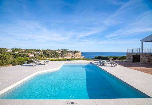 Villa en Cala Santanyi - Villa Can Ferrando casa vacacional en Cala Santanyi en primera línea de mar con lujo mediterráneo Villa en Cala Santanyi - Villa Can Ferrando casa vacacional en Cala Santanyi en primera línea de mar con lujo mediterráneo
