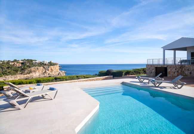 Villa en Cala Santanyi - Villa Can Ferrando casa vacacional en Cala Santanyi en primera línea de mar con lujo mediterráneo Villa en Cala Santanyi - Villa Can Ferrando casa vacacional en Cala Santanyi en primera línea de mar con lujo mediterráneo