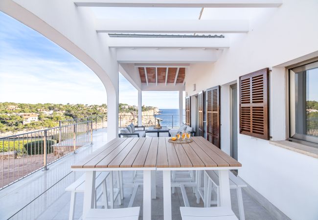 Villa en Cala Santanyi - Villa Can Ferrando casa vacacional en Cala Santanyi en primera línea de mar con lujo mediterráneo Villa en Cala Santanyi - Villa Can Ferrando casa vacacional en Cala Santanyi en primera línea de mar con lujo mediterráneo