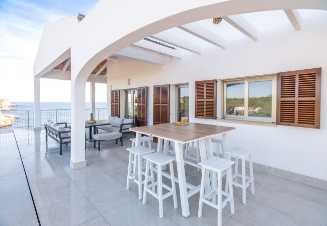 Villa en Cala Santanyi - Villa Can Ferrando casa vacacional en Cala Santanyi en primera línea de mar con lujo mediterráneo Villa en Cala Santanyi - Villa Can Ferrando casa vacacional en Cala Santanyi en primera línea de mar con lujo mediterráneo